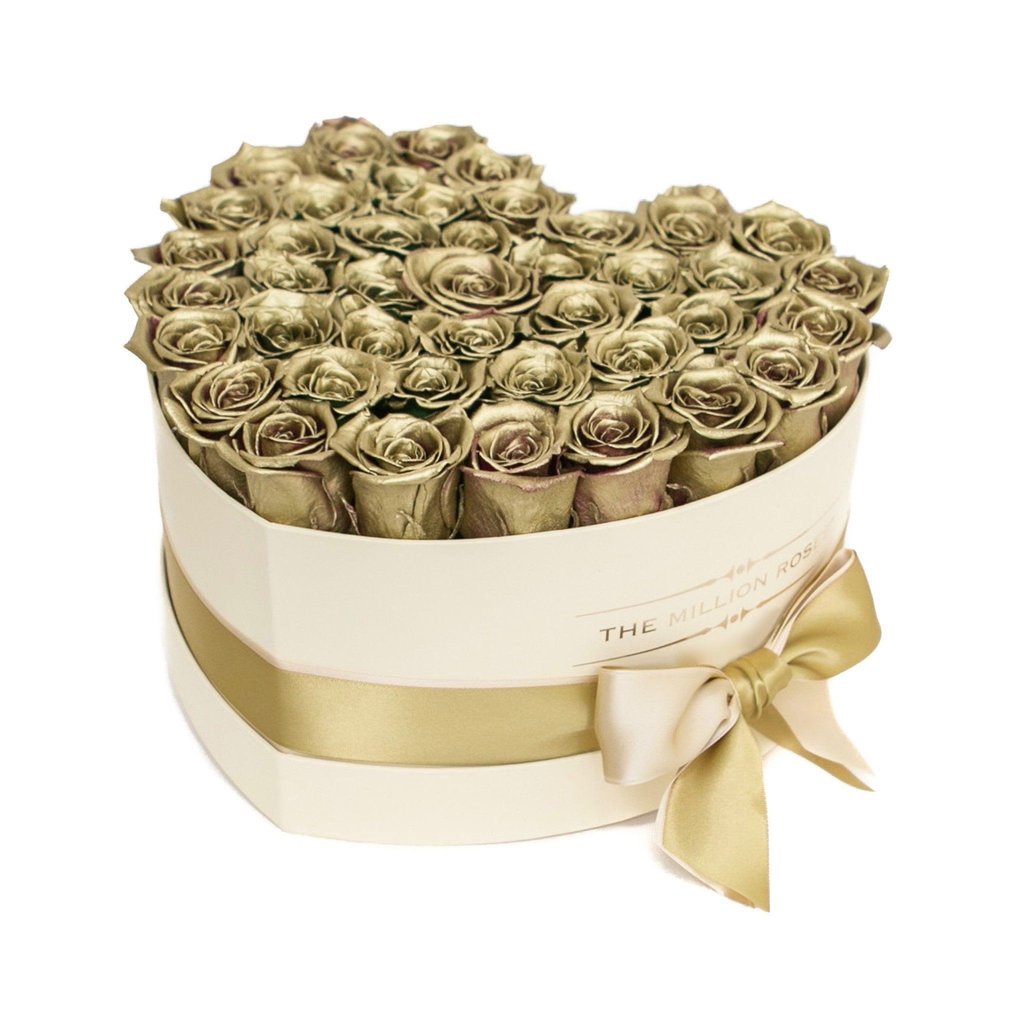 TRANDAFIRI CRIOGENAȚI AURII ÎN CUTIE ‘THE MILLION HEART’ TIP INIMĂ VANILLA CREM